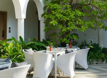 Oceanature Resort Nagaon outdoor seating garden area in Alibaug